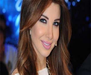   مصر اليوم - نانسي عجرم تطرح أغنية بنوتة بميت راجل